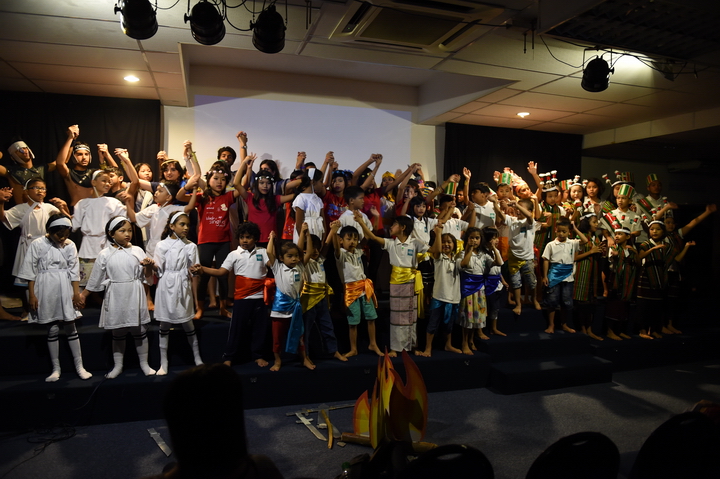 Students on stage at a school concert
